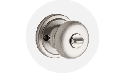 Kwikset Hancock Collection Knob product isolated on top of a gray circle